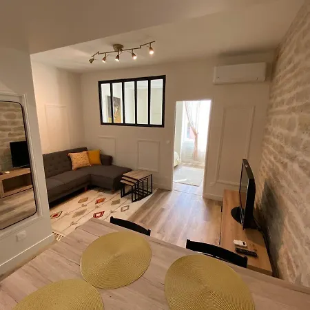 Апартаменты Lovely With Patio